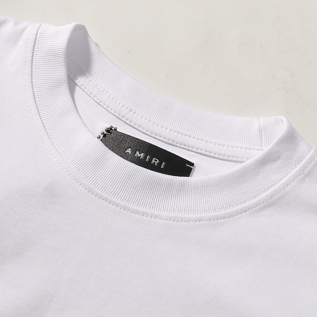 AMRI Oval T-Shirts